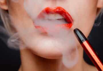 woman with red lipstick and red lipstick